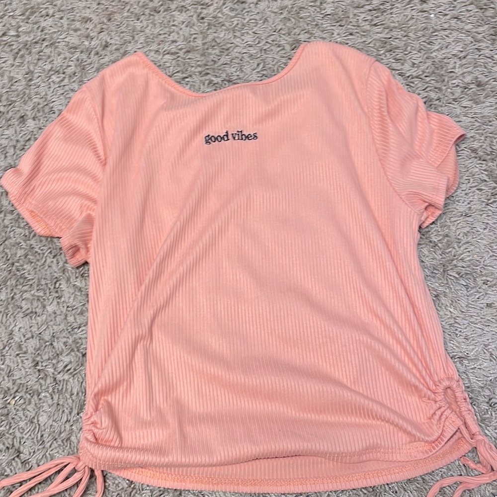 Used /like new! adjustable strings on the side.